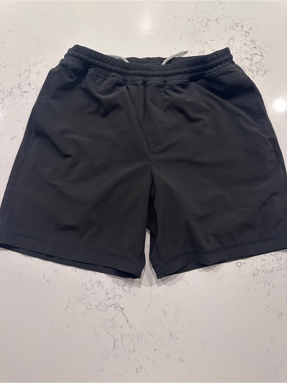 chubbies Black Men's Lined Hybrid Athletic Shorts 7”